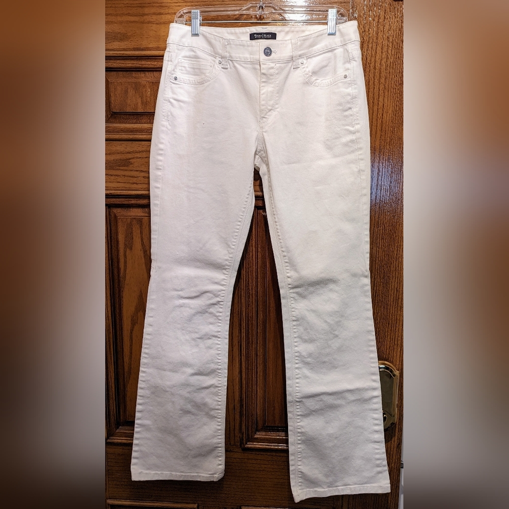 White bootleg mid-rise White House Black Market jeans in size 8 regular.